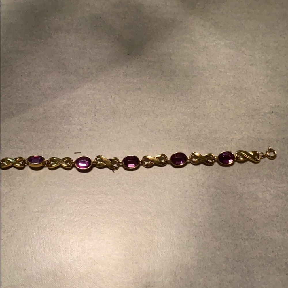 Gold & amethyst costume bracelet 7in long.